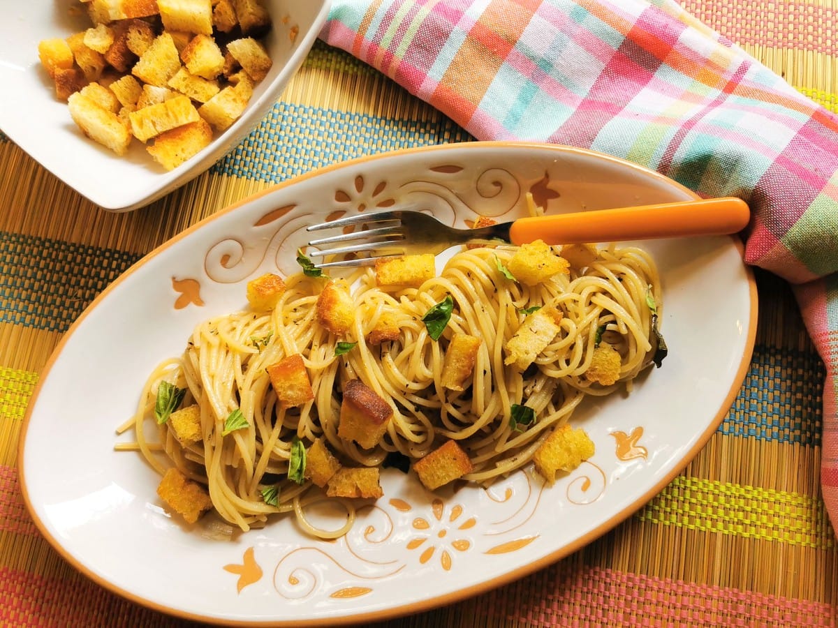 Anchovy pasta with croutons seafood recipe from Naples. 